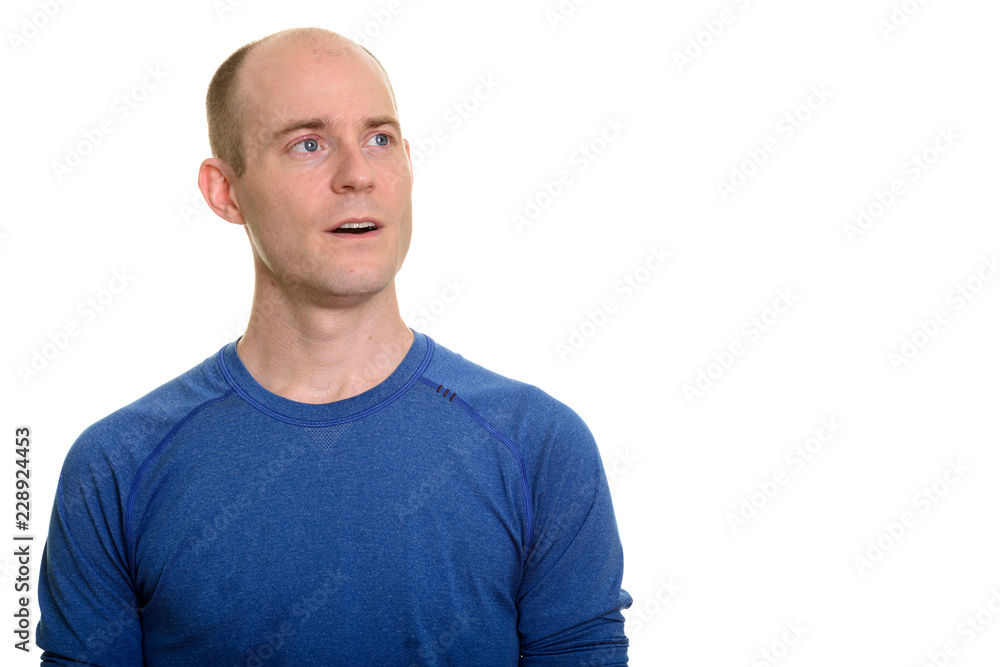 Bald Caucasian man thinking while looking up Bald Caucasian man thinking while looking up
