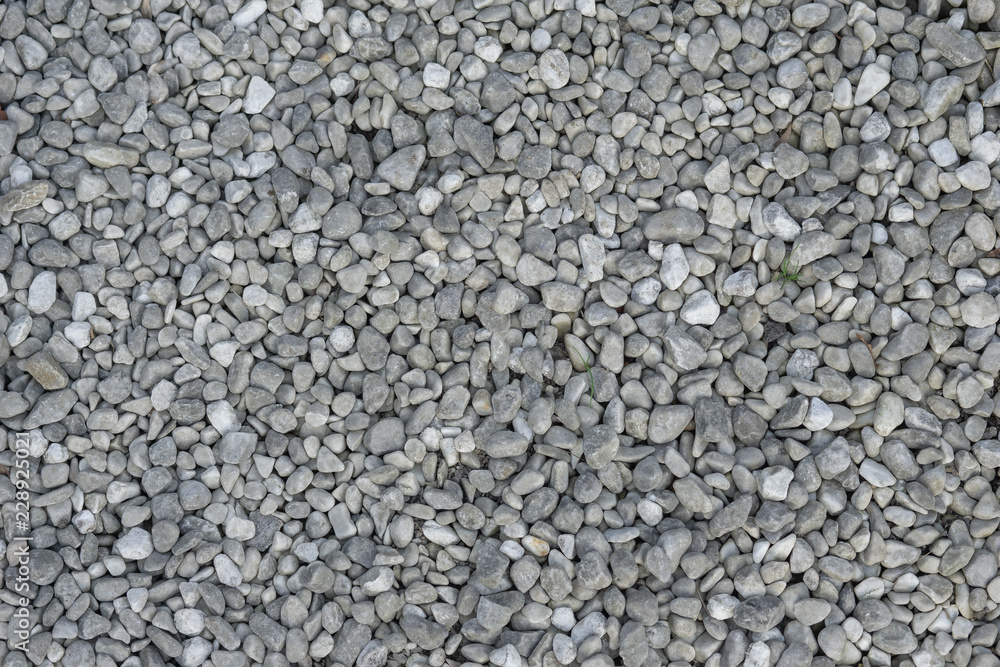 Small chips of marble for landscaping close-up, textured background. Small chips of marble for landscaping close-up, textured background.