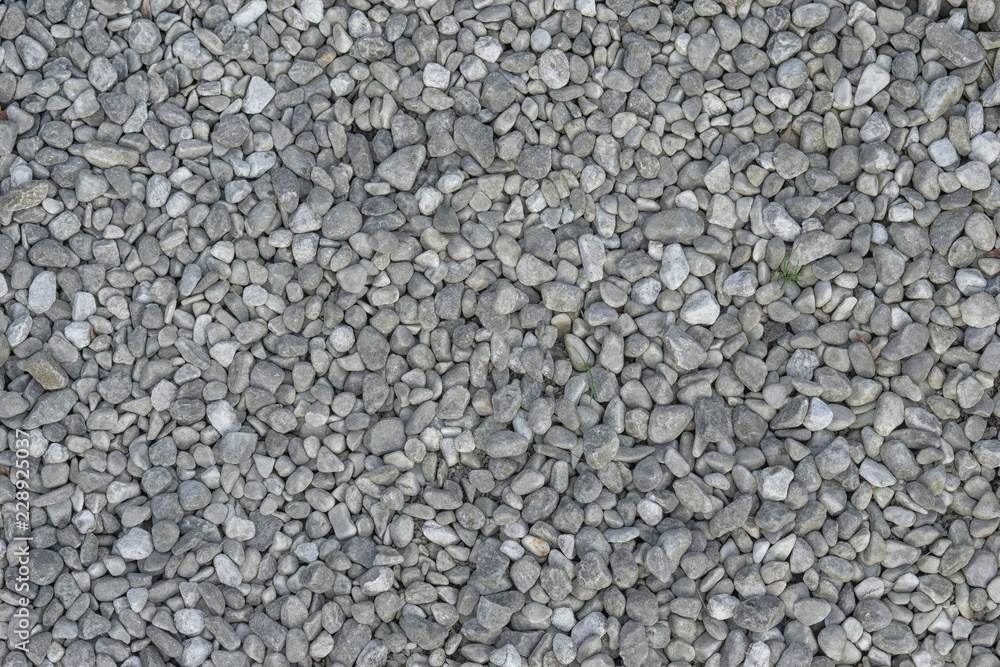 Small chips of marble for landscaping close-up, textured background. Small chips of marble for landscaping close-up, textured background.