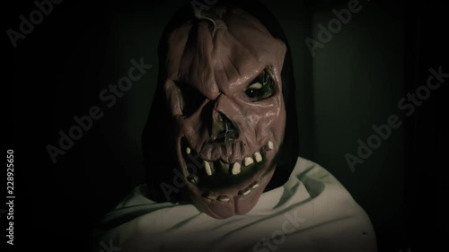 Pumpkin mask ghost with jump scare moment