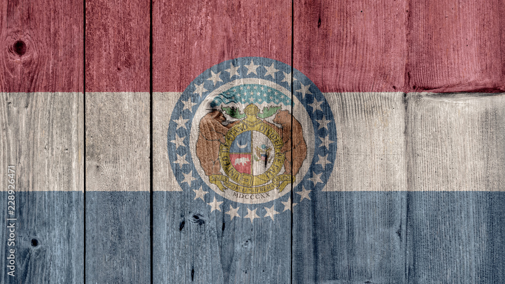 USA Politics News Concept: US State Missouri Flag Wooden Fence