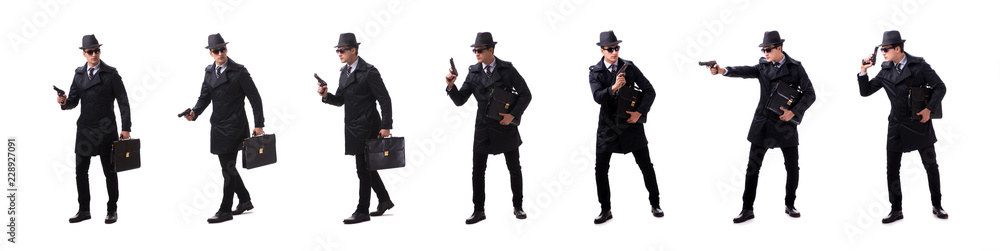 Man spy with handgun isolated on white background Man spy with handgun isolated on white background