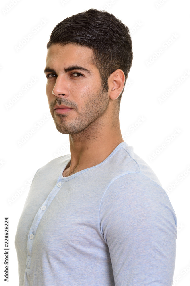 Obraz premium Studio portrait of young handsome Persian man