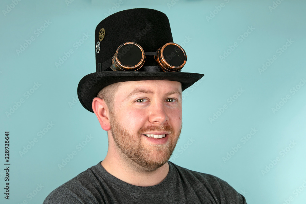 Serious man in a top hat looking solemnly ahead Serious man in a top hat looking solemnly ahead
