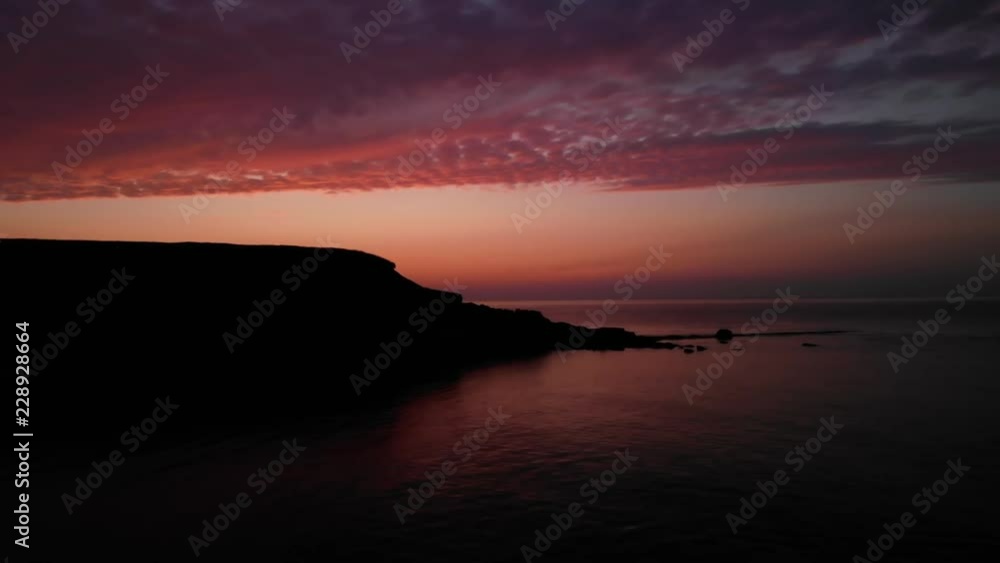 Aerial Of Amazing Golden Ocean Sunset And Cape With Calm Waves Aerial Of Amazing Golden Ocean Sunset And Cape With Calm Waves