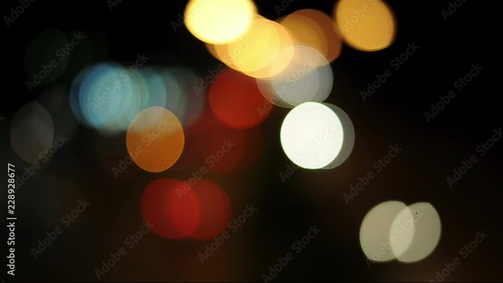 Boken blurred colors, beautiful, bright abstract. A blend of beautiful colors. Follow the fire at night. And the blur of the picture. Can be used as a background image in various tasks. And celebratio Boken blurred colors, beautiful, bright abstract. A blend of beautiful colors. Follow the fire at night. And the blur of the picture. Can be used as a background image in various tasks. And celebratio