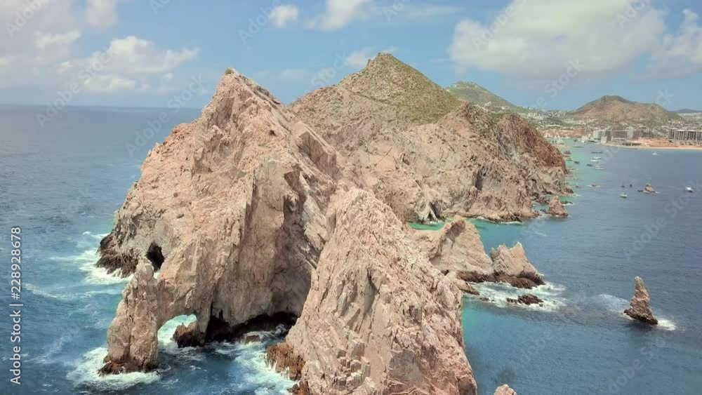 Aerial Backward: Arch Rock formation under the Sun Aerial Backward: Arch Rock formation under the Sun