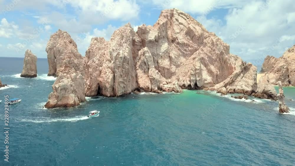 Aerial Forward Rise: Rock formation Cliffs And Sea Aerial Forward Rise: Rock formation Cliffs And Sea