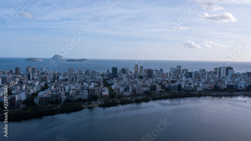 aerial view of the drone of the lagoon in rio de janeiro and copacabana, at dusk