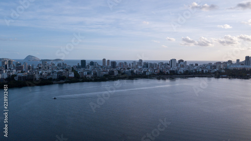 aerial view of the drone of the lagoon in rio de janeiro and copacabana, at dusk © Marcos