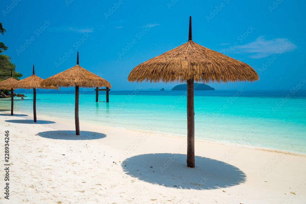 Beautiful tropical island white sand beach blue sky sunny day - Summer breeze holiday