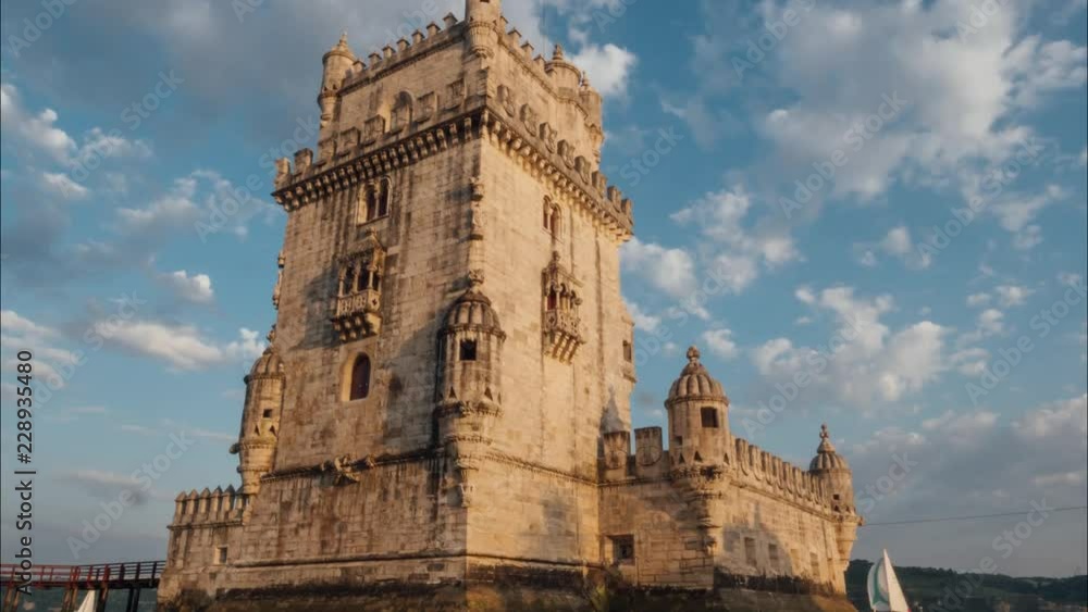 Belem tower is an ancient fort timelapse at sunset, Lisbon, Portugal Belem tower is an ancient fort timelapse at sunset, Lisbon, Portugal