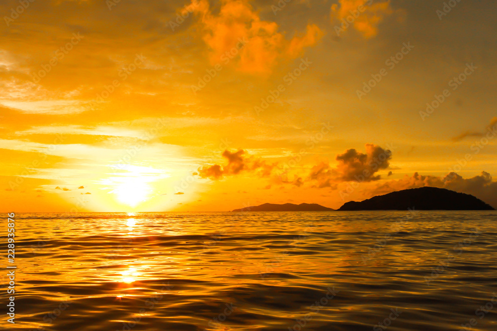 Fototapeta premium Orange view of orange sea sunset in thailand