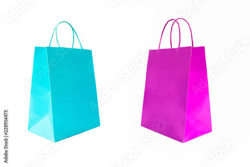 Cyan and pink shopping bags isolated on white background.