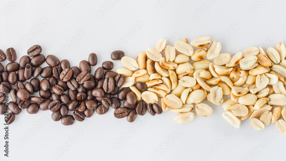 raw coffee and nuts on white background. raw coffee and nuts on white background.