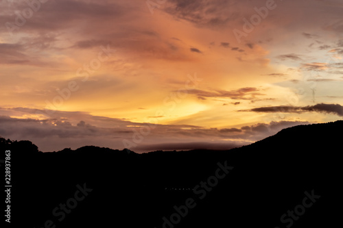 Obraz na płótnie A dramatic sunrise over the city of Patong from the southern hillside. w salonie