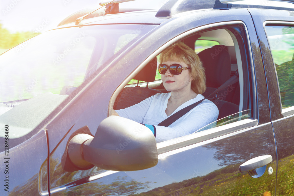 Naklejka premium Woman car driver