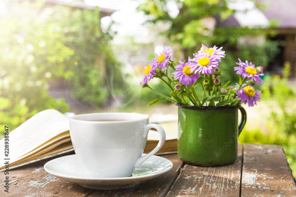 A Cup of tea on a wooden table. A Cup of tea on a wooden table.