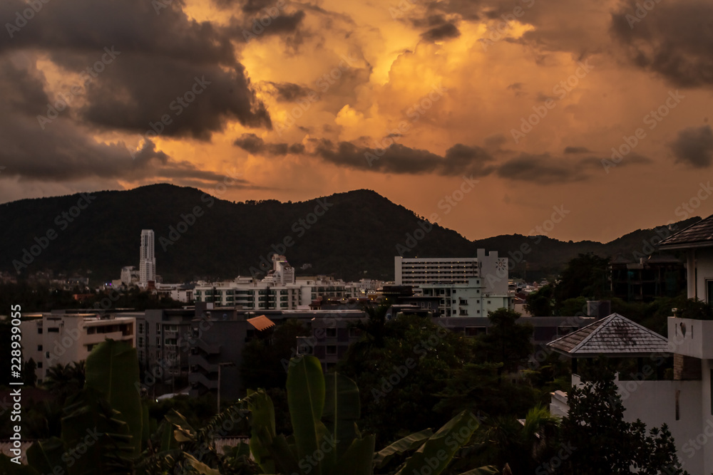 A dramatic sunrise over the city of Patong from the southern hillside.