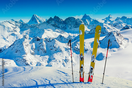 Ski in winter season, mountains and ski touring backcountry equipments on the top of snowy mountains in sunny day, Verbier Switzerland. © Gorilla