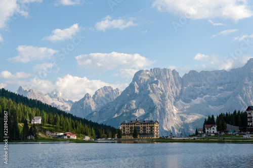 Imression of the buildings along the shoreline of Lake Misurina, in the Italian Dolomites, on a Summer's Afternoon. photo