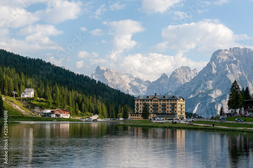 Imression of the buildings along the shoreline of Lake Misurina, in the Italian Dolomites, on a Summer's Afternoon. © Goldilock Project