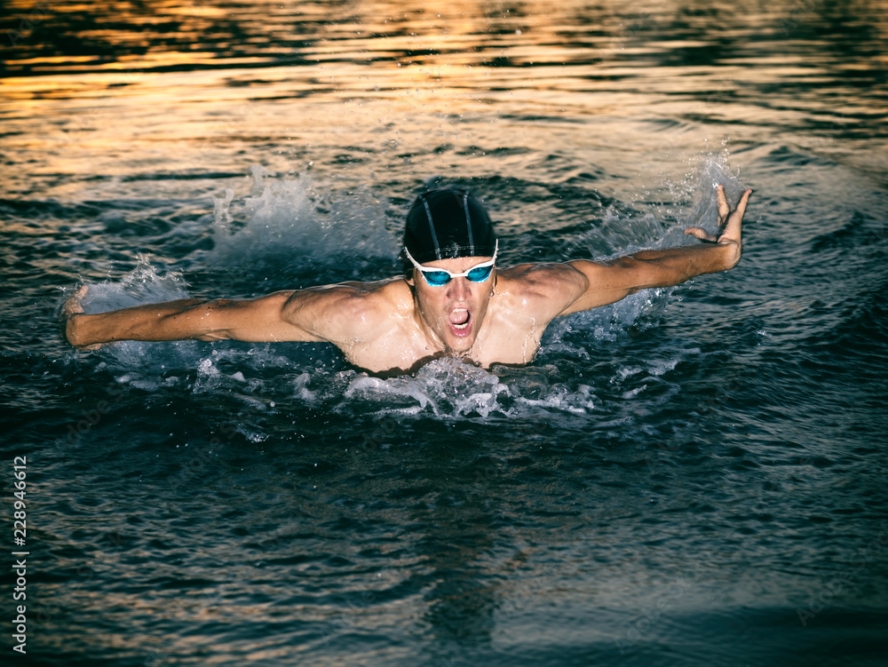 Fototapeta premium Swimmer breathing during swimming butterfly