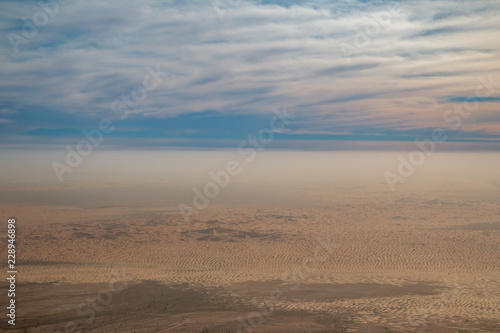 Panoramic view of hazy Arabian desert with sand dunes at Al Ain  UAE