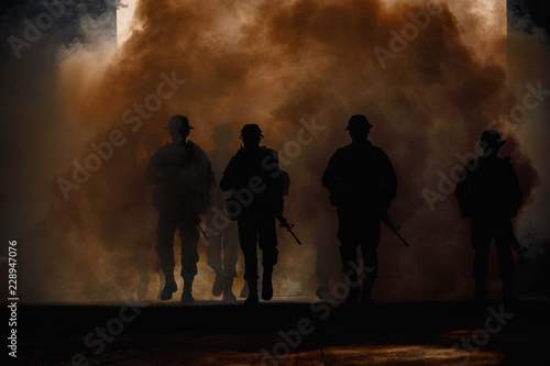 soldiers walkers carry weapon of fire