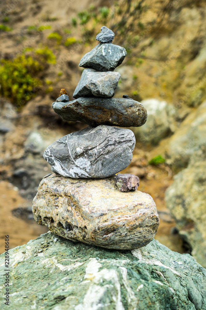 Lands End, San Francisco, United States: March 24, 2018 - People keeps coming here to put the stones together to build some special artwork. Lands End, San Francisco, United States: March 24, 2018 - People keeps coming here to put the stones together to build some special artwork.