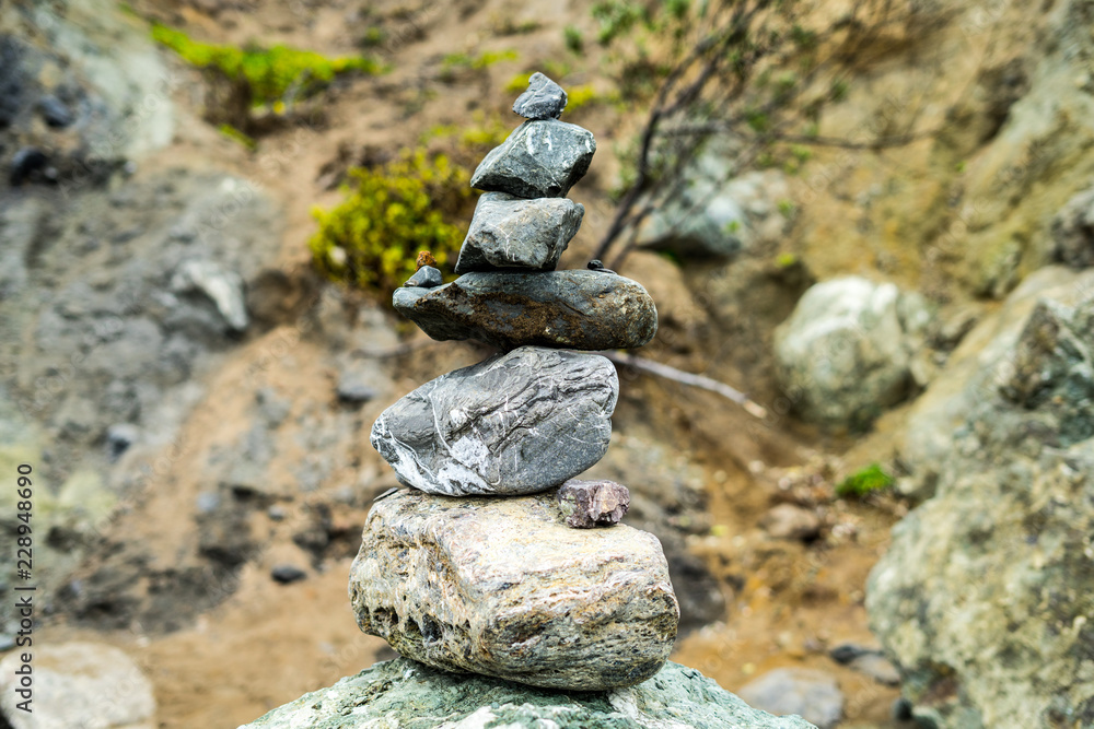 Lands End, San Francisco, United States: March 24, 2018 - People keeps coming here to put the stones together to build some special artwork. Lands End, San Francisco, United States: March 24, 2018 - People keeps coming here to put the stones together to build some special artwork.