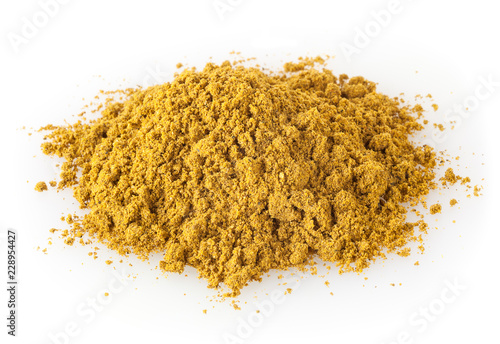 Heap of curry powder isolated on white background