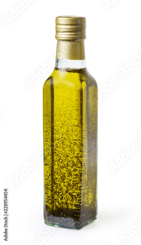 Obraz na płótnie Olive oil with basil in glass bottle isolated on white backgound with clipping path w salonie