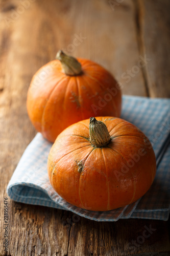 Ripe pumpkin on wooden desk