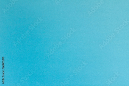 The texture of the cardboard is blue. Abstract blue background