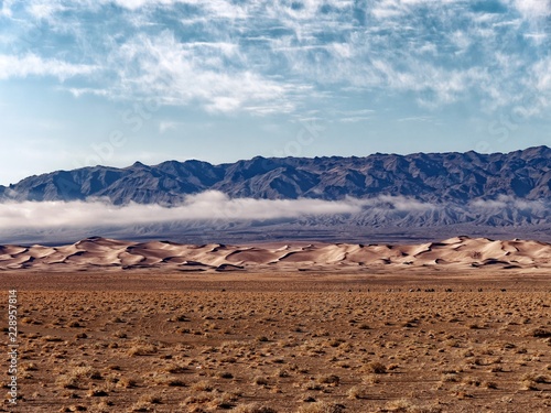 Clouds over Khongoryn Els and Gobi Mountains