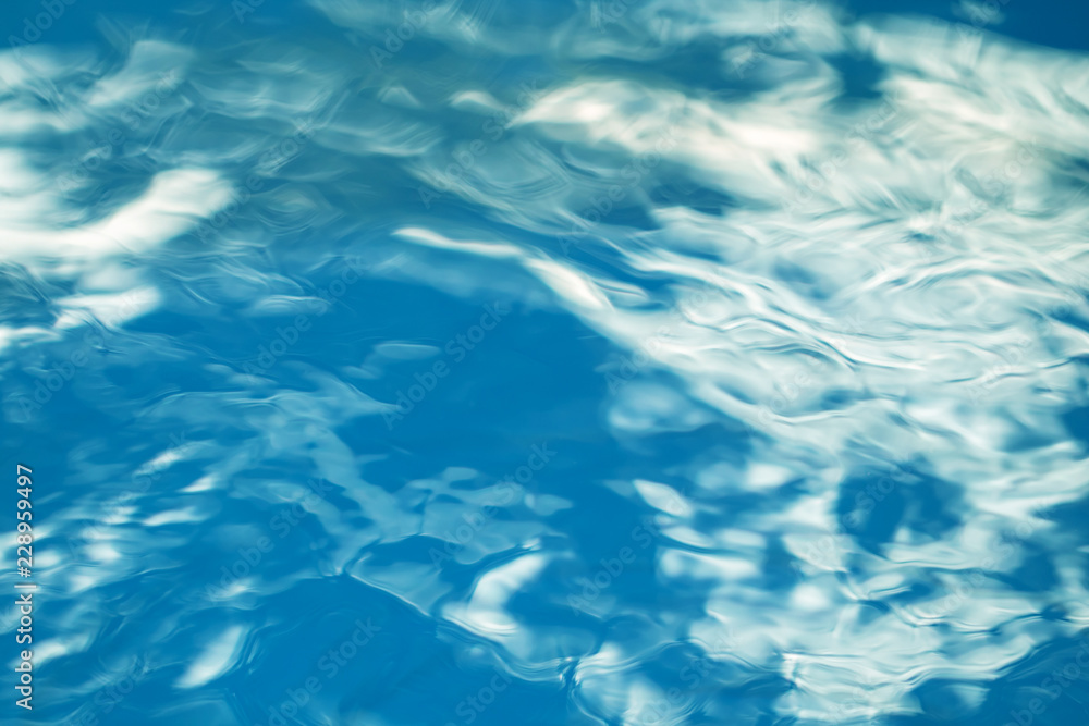 The smooth natural blue water background with bokeh abstract on the sea or ocean,vintage and soft colored blur. The smooth natural blue water background with bokeh abstract on the sea or ocean,vintage and soft colored blur.