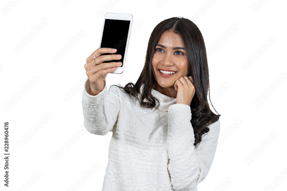 Portrait Asian woman taking selfie via technology smart mobile phone on white background, isolate include clipping path, fashion and lifestyle concept Portrait Asian woman taking selfie via technology smart mobile phone on white background, isolate include clipping path, fashion and lifestyle concept