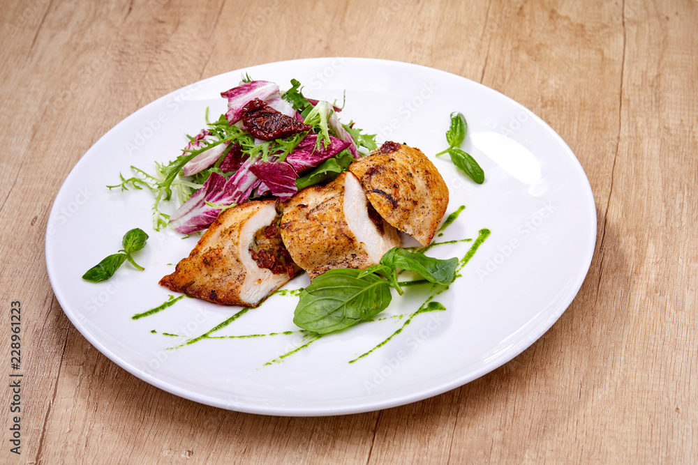 chicken breast with salad