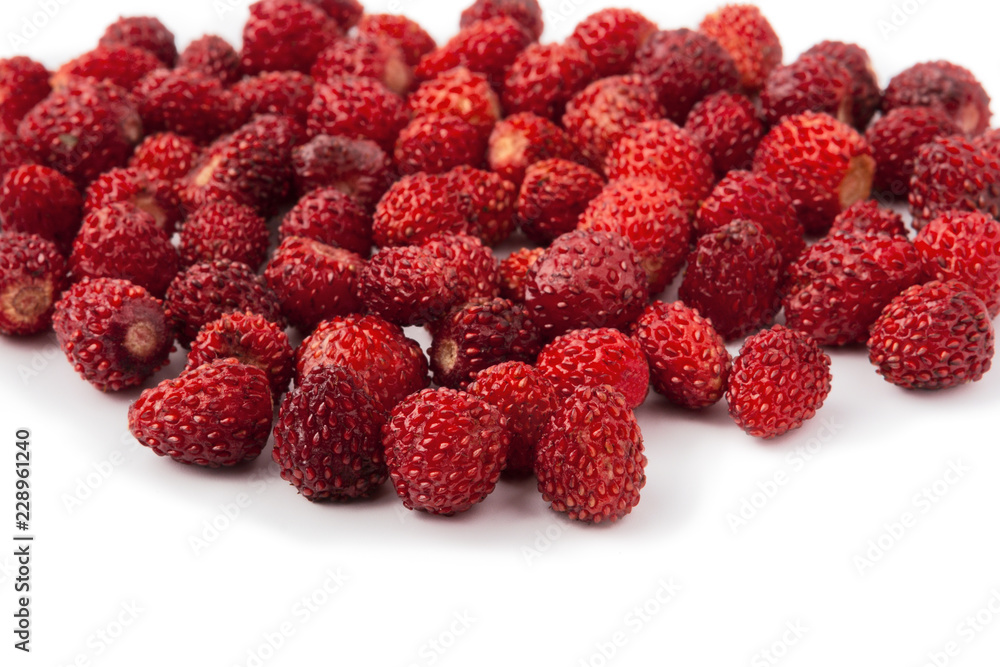 Heap wild ripe strawberry. Isolated on white Heap wild ripe strawberry. Isolated on white