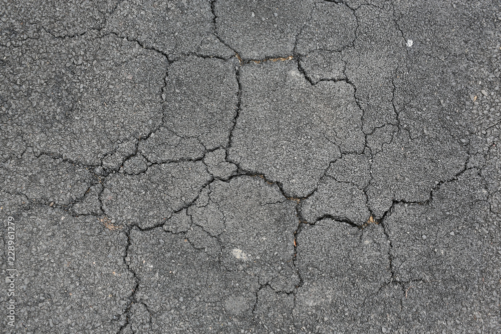Fototapeta premium Cracked asphalt background.