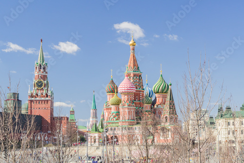Moscow, Russia - April 11, 2018:  view from Zaryadye city park on St Basils Cathedral and Spasskaya tower of Moscow Kremlin