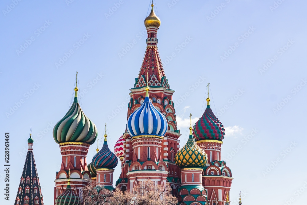 St Basil's cathedral on Red Square in Moscow. Domes the cathedral lit by the sun