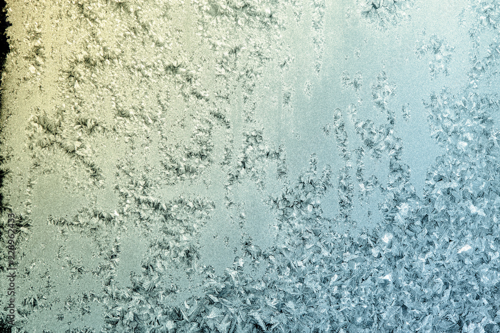 Winter frostwork on window glass Winter frostwork on window glass