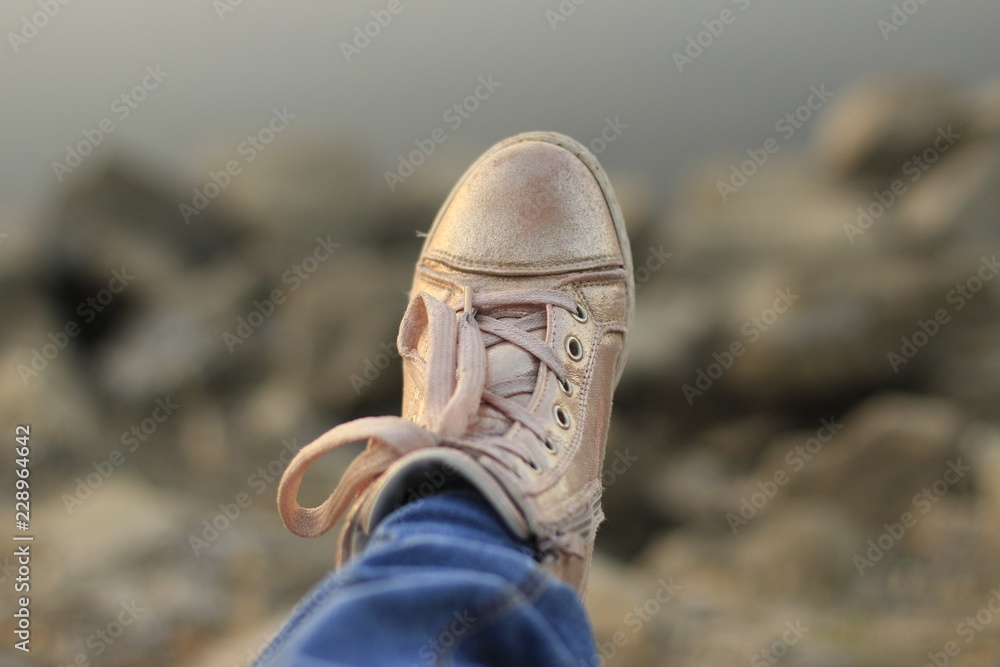 Fototapeta premium shoes, shoe, footwear, pair, isolated, leather, white, boot, old, sneakers, foot, fashion, boots, clothing, brown, dirty, two, sport, baby, walking, feet, lace