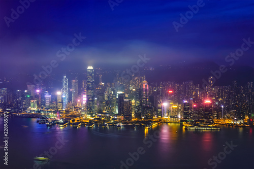 Fototapeta Naklejka Na Ścianę i Meble -  Aerial view of illuminated Hong Kong skyline. Hong Kong, China