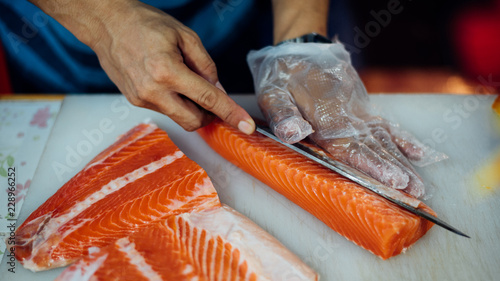 Asian chef slice japanese food sashimi salmon