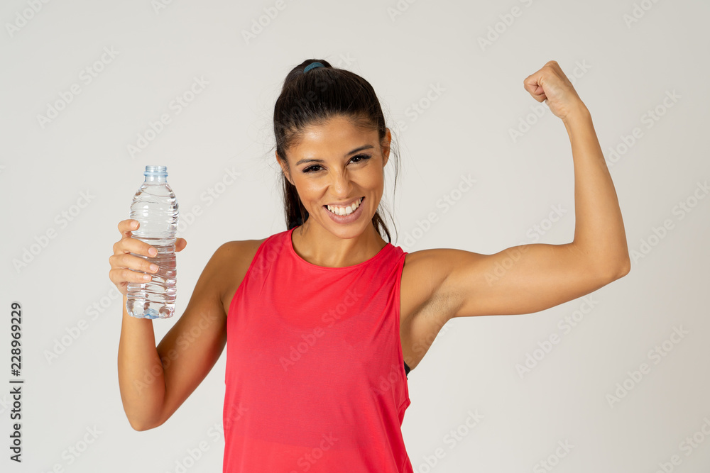 Healthy attractive sport woman holding water bottle in healthy lifestyle concept Healthy attractive sport woman holding water bottle in healthy lifestyle concept