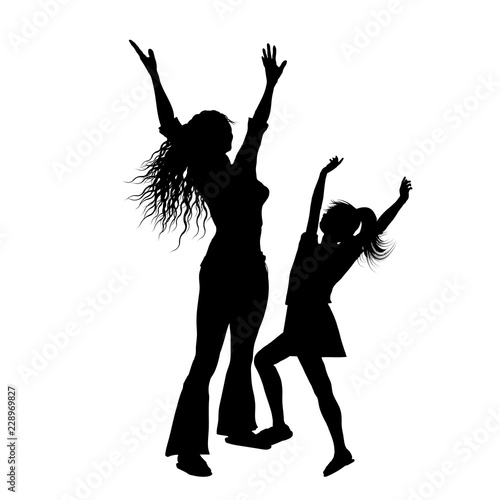 Silhouette of mother and daughter with arms raised in joy
