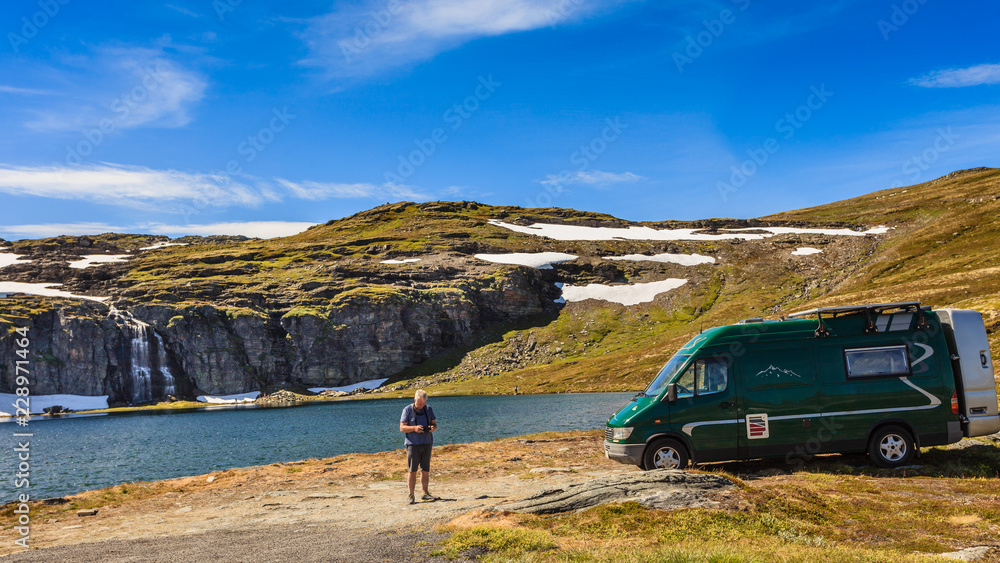 Camper car at mountain lake Flotvatnet, Aurlandsfjellet Norway